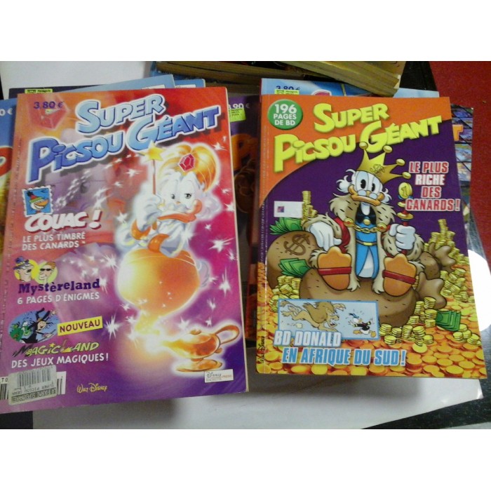 SUPER  PICSOU  GEANT (La blague a travers les siecles)  - 19 volumes -  (Super Picsou Geant; Gluma de-a lungul secolelor)